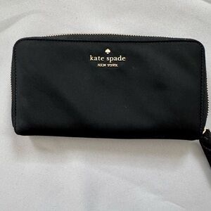 Kate Spade Black and Gold Wallet Elegant Design